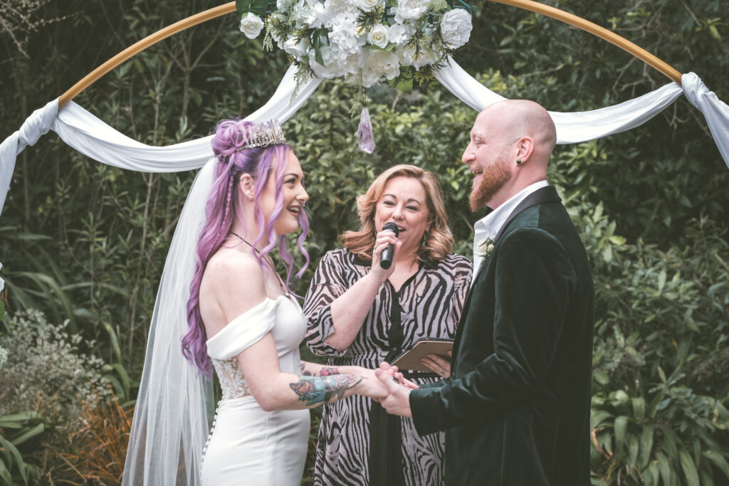 Celebrant Anna Flanagan delivering a bespoke wedding ceremony in the Botanic Gardens, Christchurch